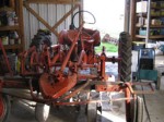 Allis Chalmers G tractor in workshop for maintenance