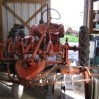 Allis Chalmers G tractor in workshop for maintenance